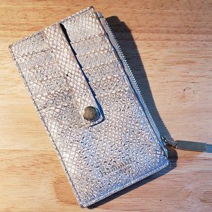 Hammit scale print clutch.